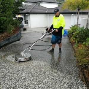 What is the difference between pressure washing and soft washing?