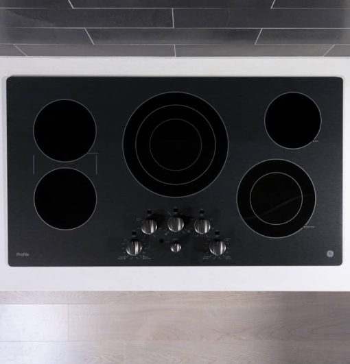 GE Profile ADA 36" Black Stainless Knob Control Electric Cooktop - Image 4