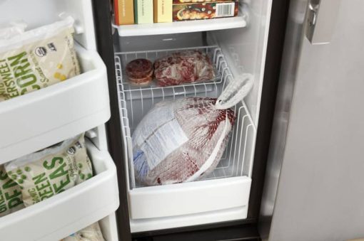 GE 23 Cu. Ft. Black Side-By-Side Refrigerator - Image 13