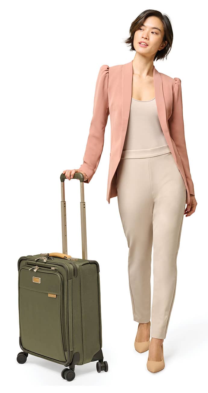 Briggs-and-Riley-Baseline-Olive-Global-Carry-On-BLU121CXSPW-7-Lifestyle.jpg
