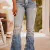 Stone Wash Ripped Knee Raw Hem Flare Jeans