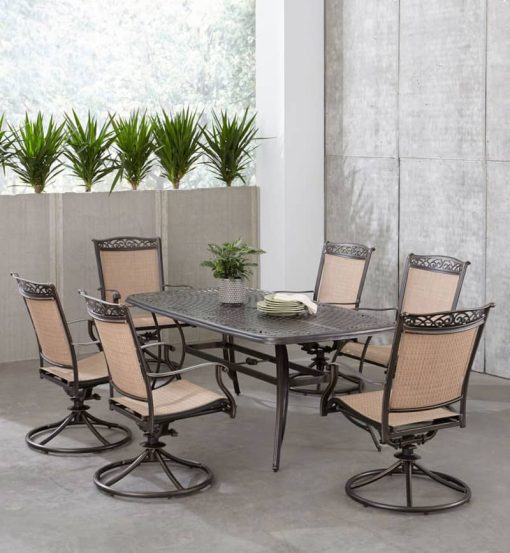 Hanover Fontana 7-Piece Outdoor Dining Set In Tan/Bronze With 6 Sling Swivel Rockers & 38x72" Cast Table - Image 2