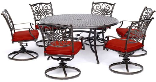 Hanover Traditions 7-Piece Outdoor Dining Set In Red/Cast With 6 Swivel Rockers, 60" Round Cast Table