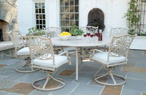 Hanover Traditions 7-Piece Outdoor Dining Set In Sand/Beige With 6 Swivel Rockers, 60" Round Cast Table - Image 2