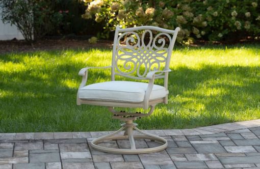 Hanover Traditions 7-Piece Outdoor Dining Set In Sand/Beige With 6 Swivel Rockers, 60" Round Cast Table, Umbrella, Base - Image 6