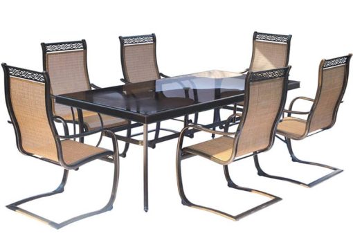 Hanover Monaco 7-Piece Outdoor Dining Set In Tan/Bronze With 6 Spring Sling Chairs, 42" x 84" Glass-Top Table
