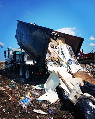 Waste Management Roll Off Truck