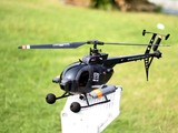 How do you flip a RC helicopter?