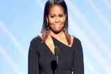 Michelle Obama unterstützt Paare bei Ehegelübden bei der Hochzeit in Chicago