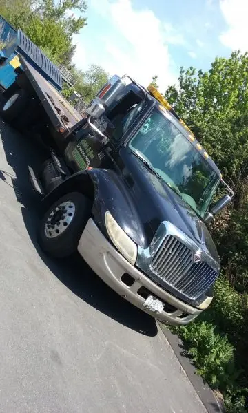 Mello's Towing Mello's Towing