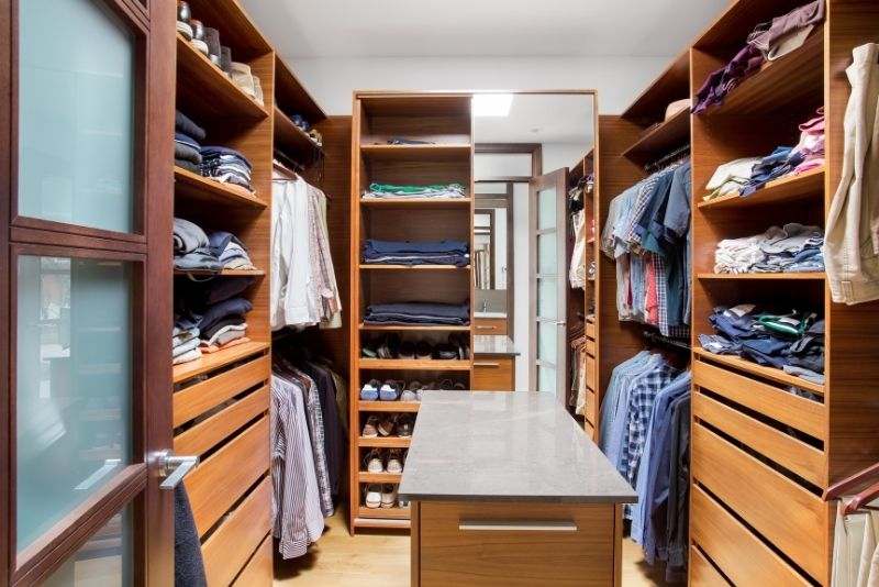walk in closet with angled ceiling